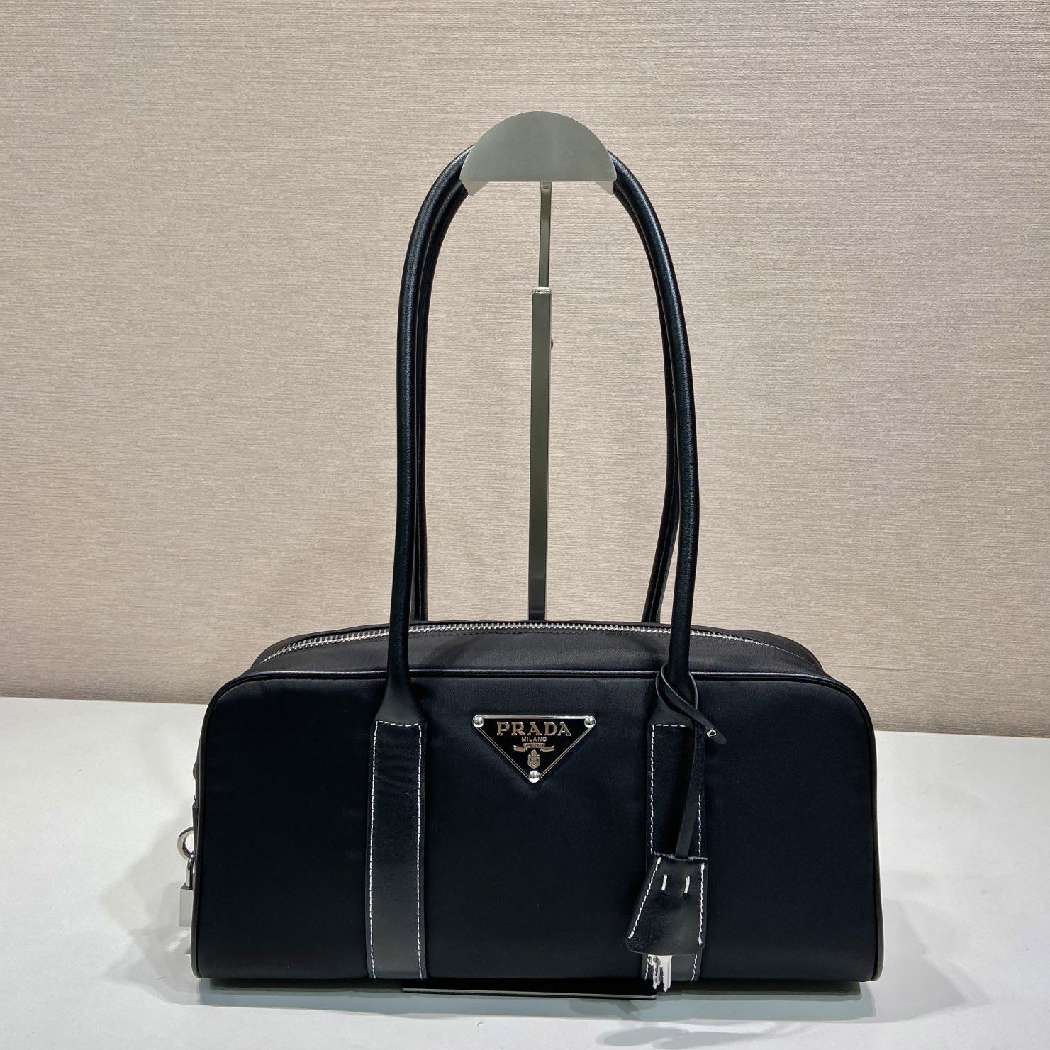 Pra*a top handle bags